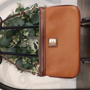 Dooney and Bourke Pebble Grain Leather Large Slim Wristlet in Brown